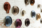 Collection of decorated hats-Book titled 'How to Style a Hat-Brittany Cobb
